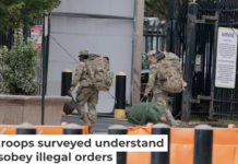 National Guard members arrive at the Guard’s headquarters at D.C. Armory on Aug. 12, 2025 in Washington. Anna Moneymaker/Getty Images